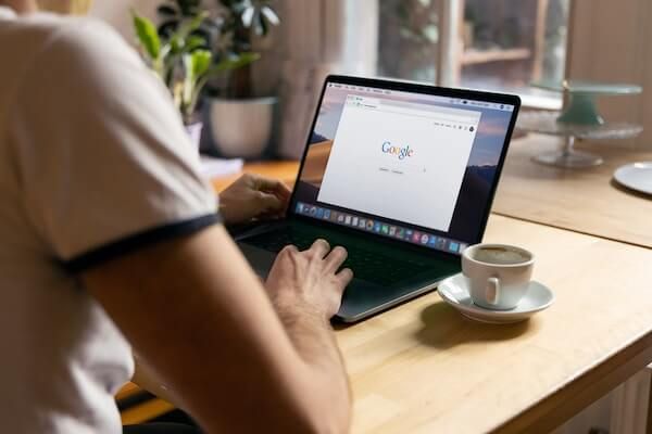 Man with a laptop on a table