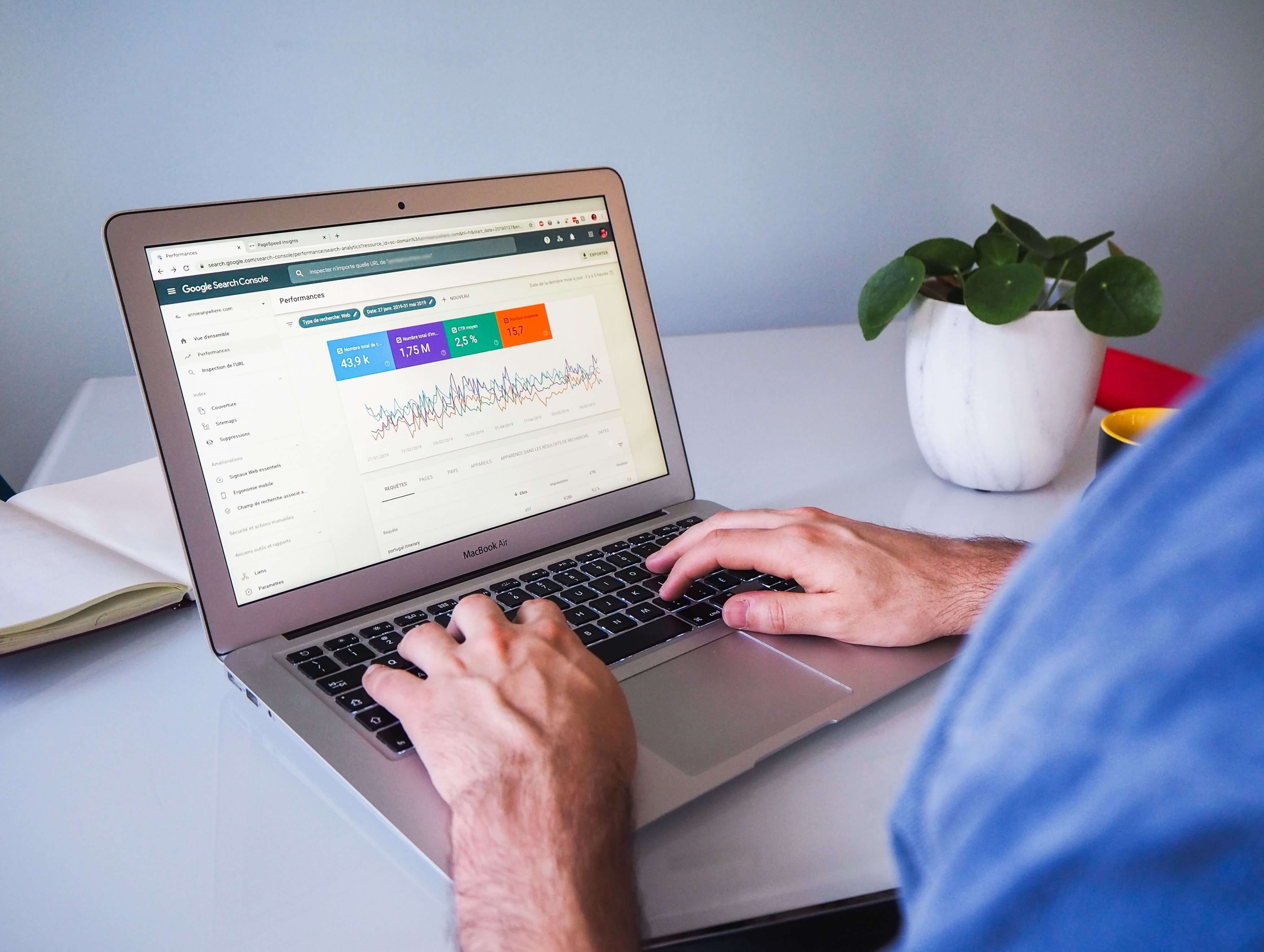 Man typing on a laptop